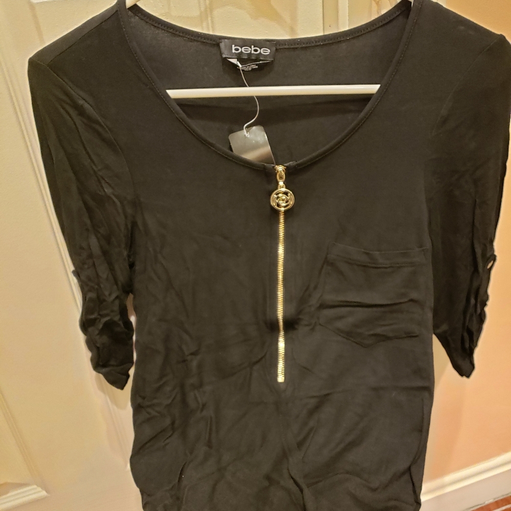Bebe black top. New with tags